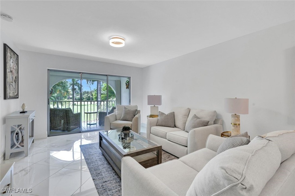 1055 Forest Lakes Dr unit F203, Naples, FL 34105 - photo 1