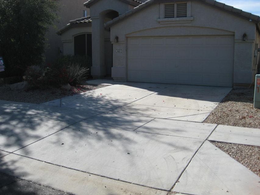 front of house...2 car garage..full tile