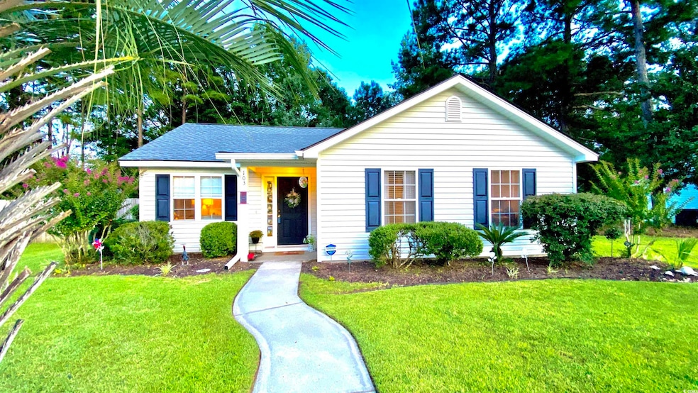 Bungalow featuring a front yard and roof with shingles