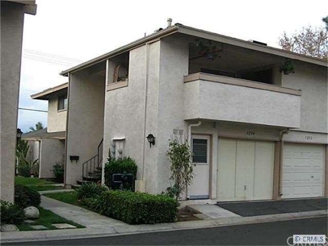 Very Desirable Up Stairs End Unit With A View.