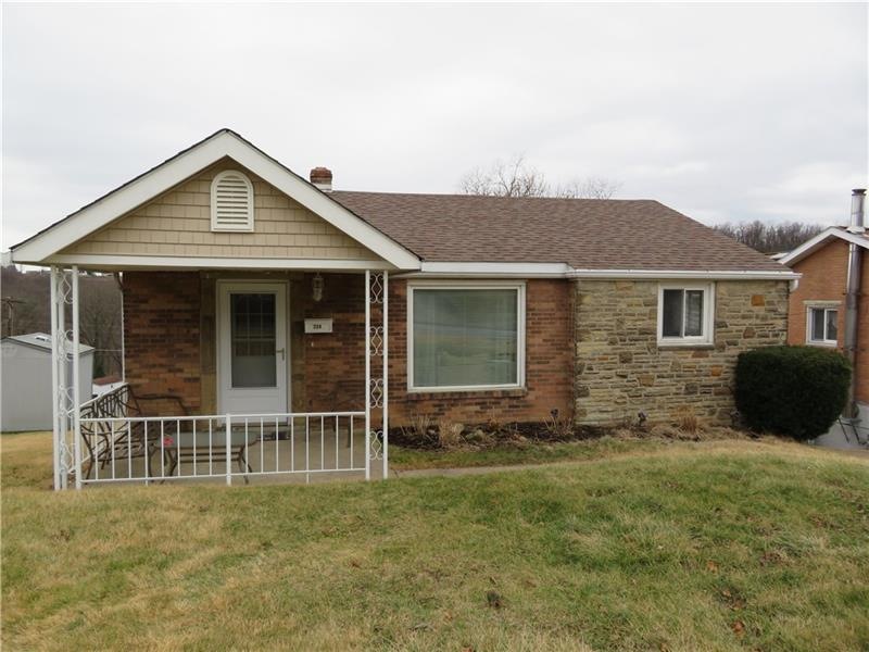 Stylish brick/stone level entrance ranch with larg