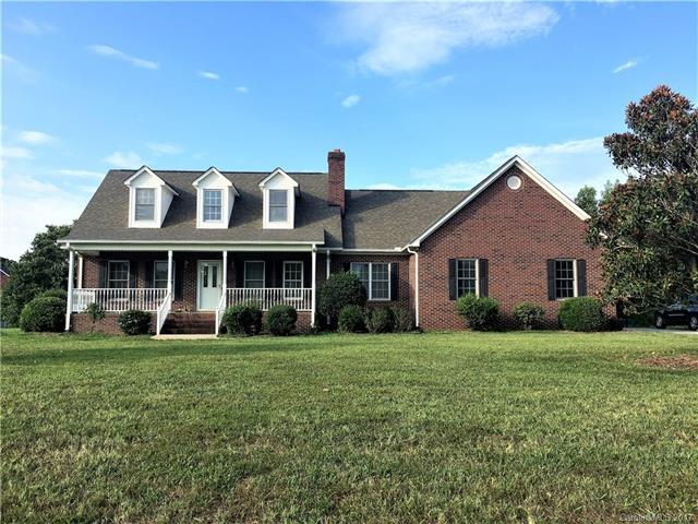 Solid full brick Cape Cod with rocking chair front