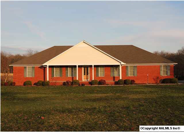 ONE YEAR HOME WARRANTY PROVIDED-Move in ready brick home on 4.5 acres. Well maintained with 3 bedrooms and 2 full baths, large family room with double trey ceiling and gas fire place. Lovely foyer has glass doors that open to formal dining room. Huge kitc