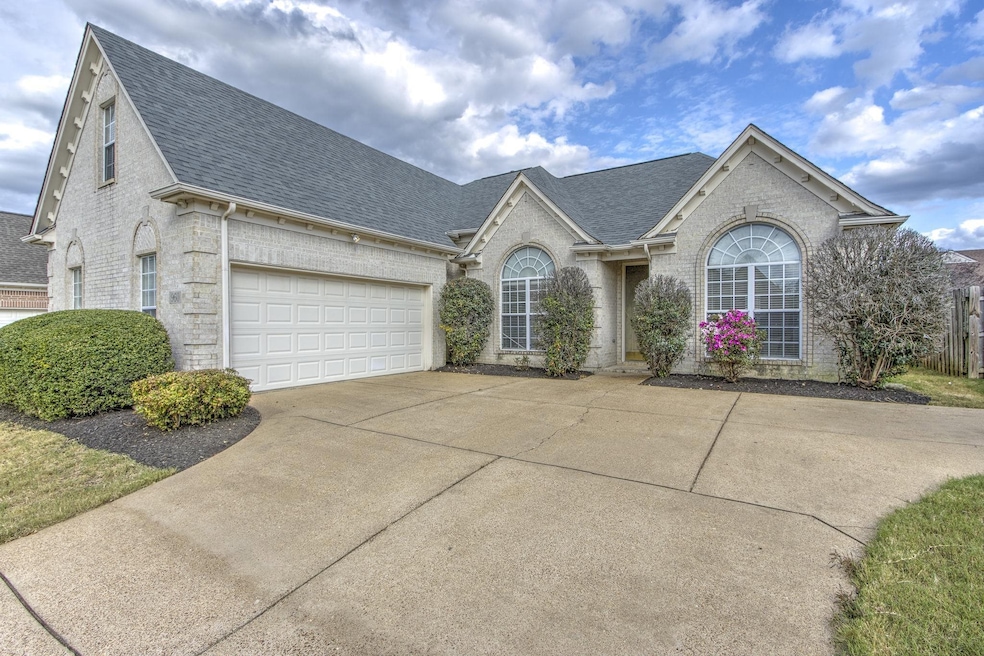 View of front of home featuring a garage