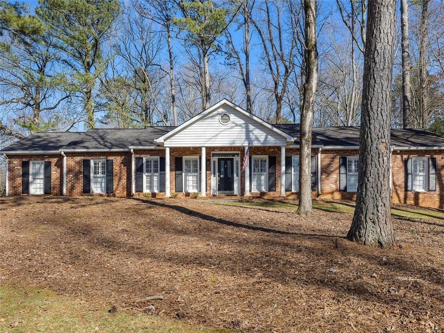 4-sided brick ranch just minutes to Canton Street