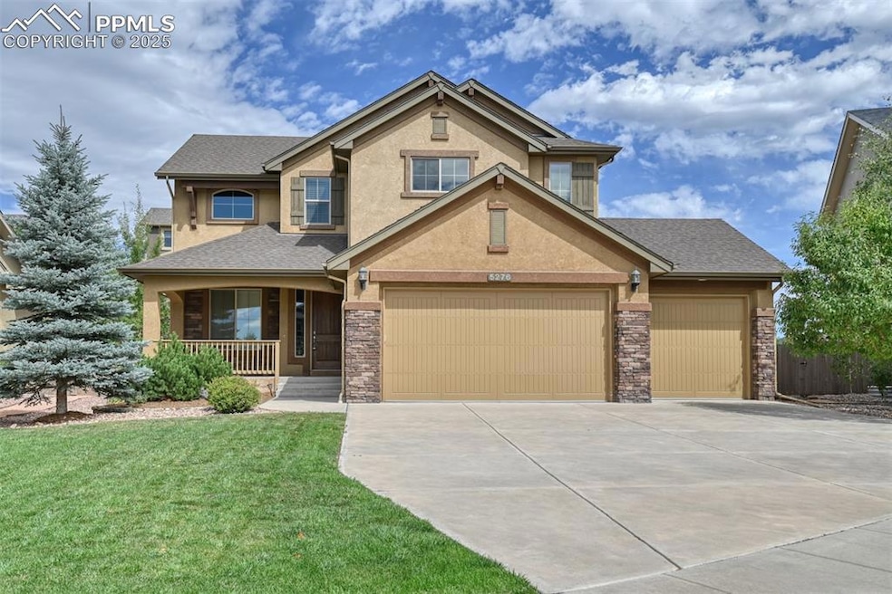 Craftsman house with a garage, covered porch, and 