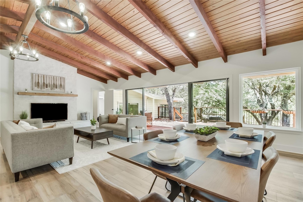Dining space featuring a wood ceiling with expose