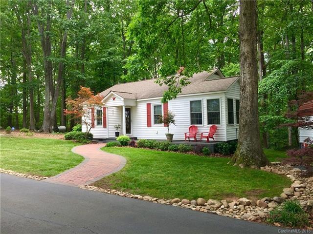 This adorable gem is nestled on 4.34 acres in a pr