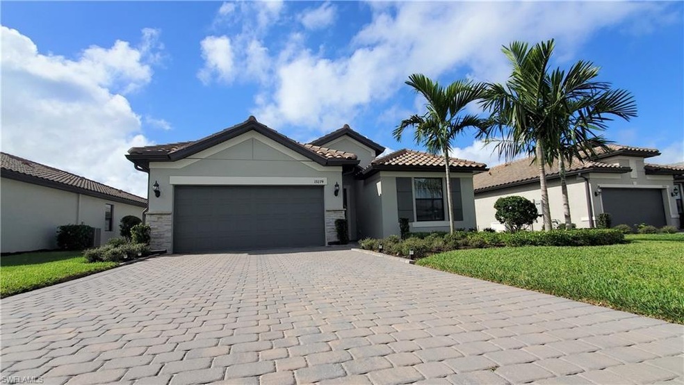 Front of the house and its long driveway