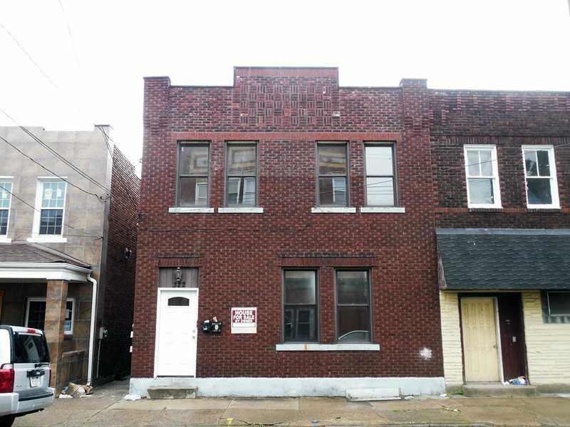 Exterior Front. This building containing two separ