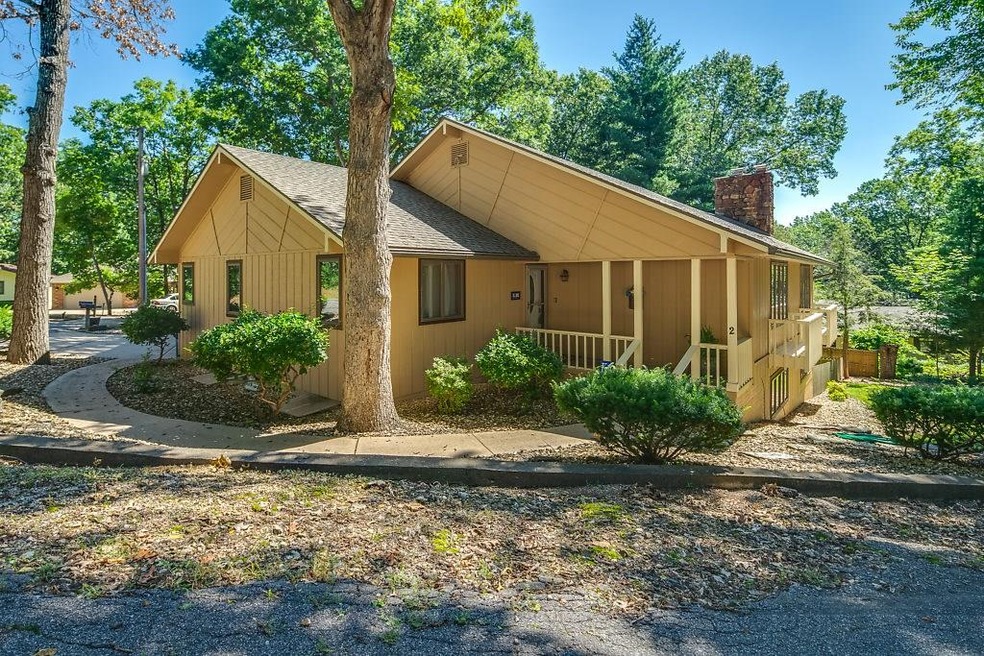 Exterior View of home and path from driveway to the front door