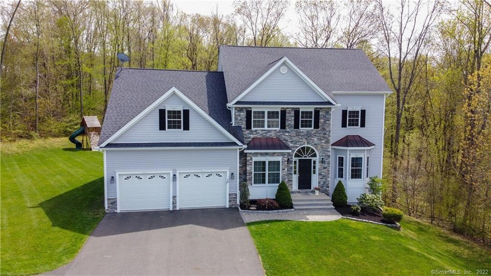 Custom designed built in 2012 sits on a 1 acre lot located at the end of the cul-de-sac. Offering Lush professional landscaped yard with private country setting in the back yard, backs to woods. Irrigation system.