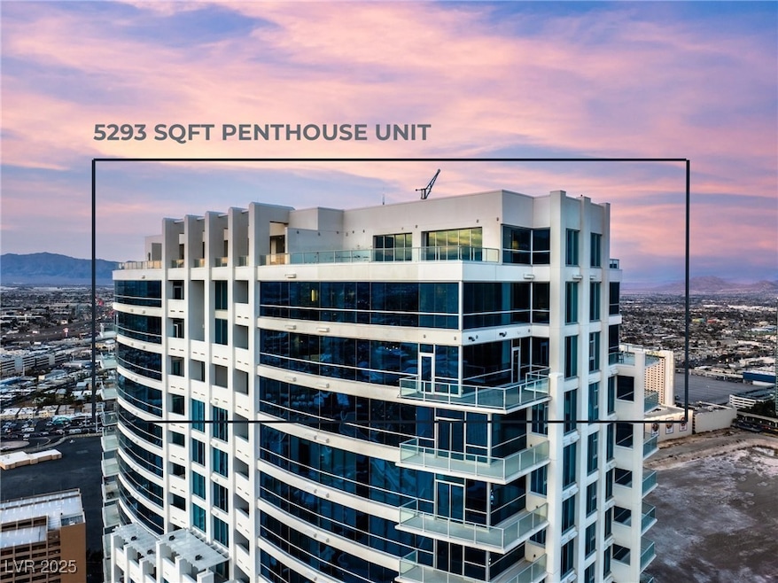 Property at dusk featuring a view of city