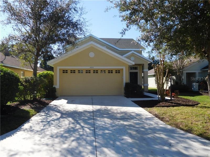 Wonderful curb appeal! Mature landscaping, freshly