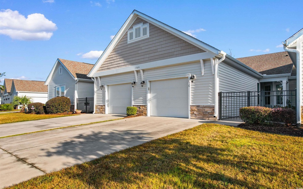 View of front of property featuring a front yard a
