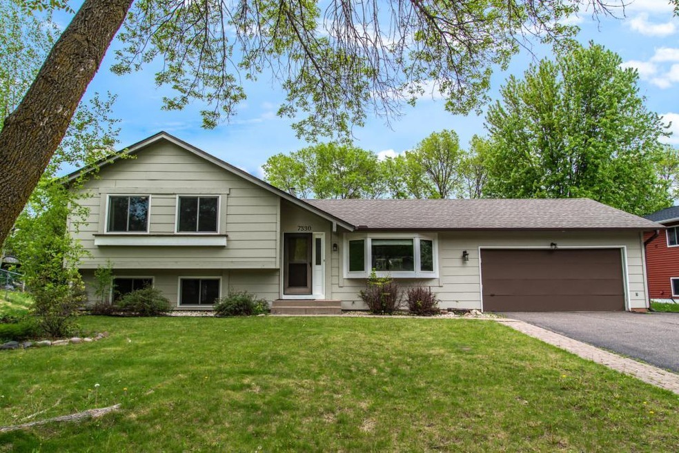Come Home to this wonderful Maple Grove house