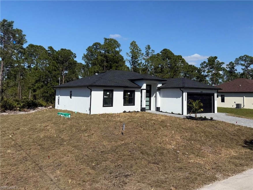 View of front of property featuring a front yard, 