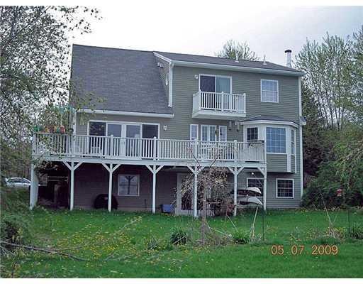 Exterior Back. Expansive deck on...