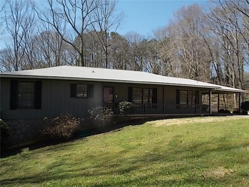 Handsome 4 bedroom, 3 bathroom ranch is located in