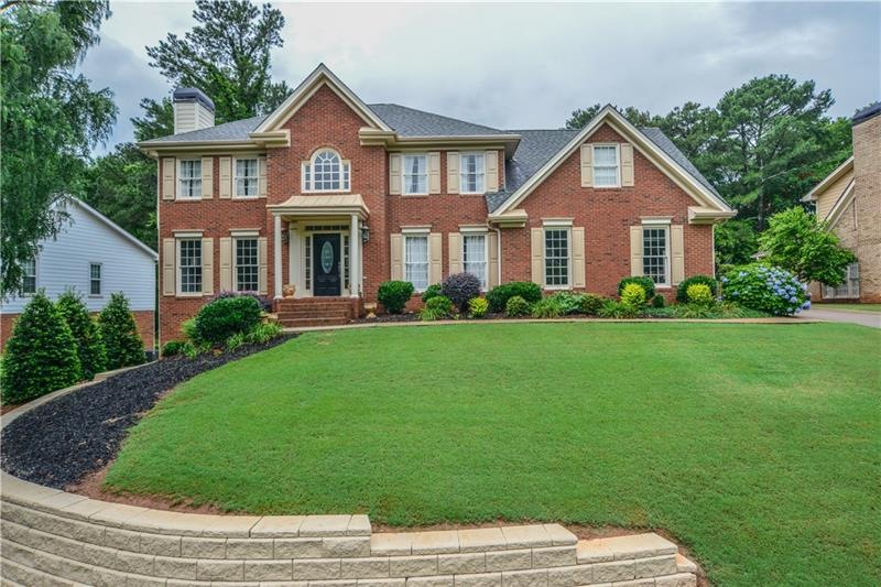 3 side brick traditional updated home, open floor 