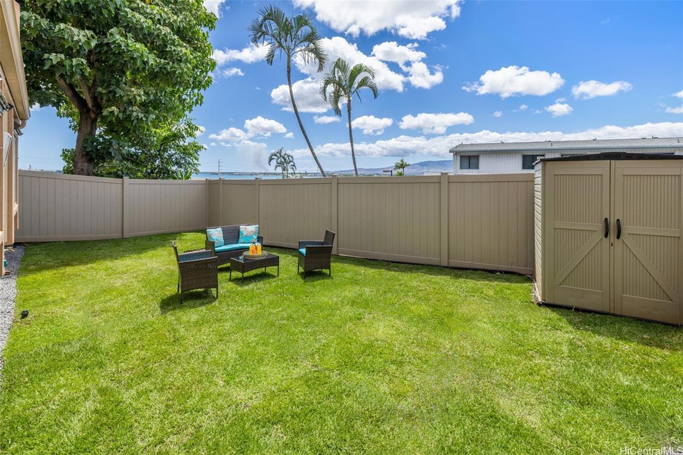 This condo has a rare back yard measuring approxim