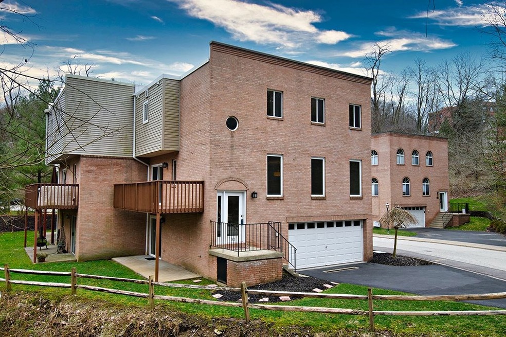 Contemporary townhouse with 2 car garage.