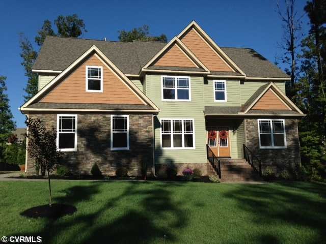 Exterior Front - South River Custom Homes. Stone a