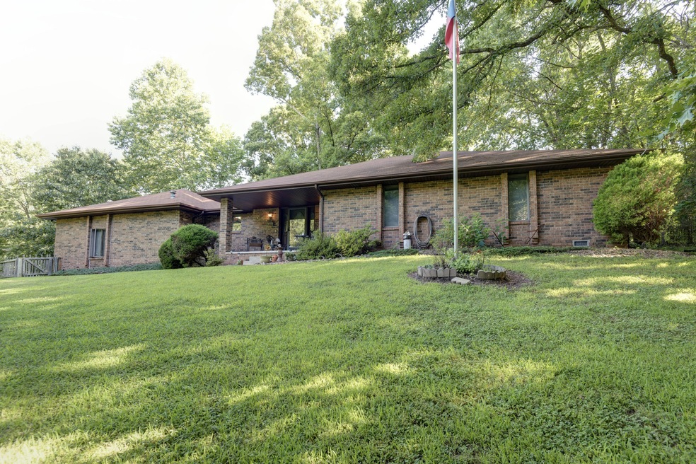 view of all brick home