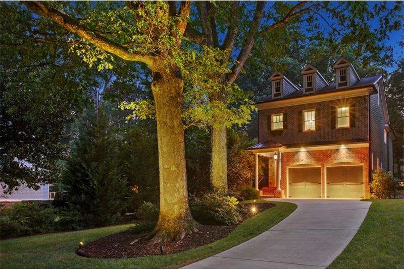 Gorgeous brick and stone home with private drive a
