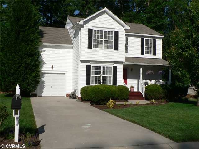 Exterior Front - Front of House with Concrete Driv