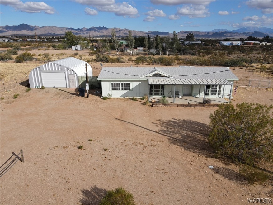 View of front of property featuring a garage and a