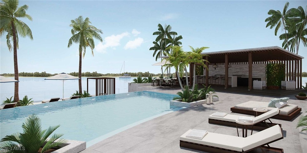 View of swimming pool with a water view and a pati