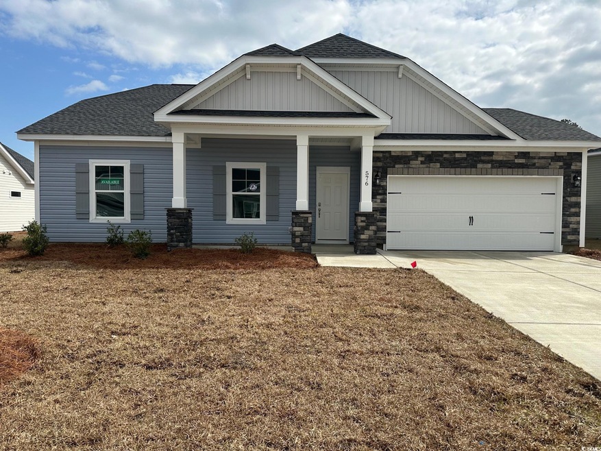 Craftsman inspired home with a garage, board and b