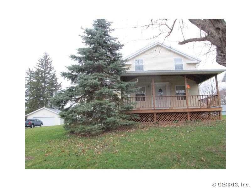 Exterior Front. LARGE OPEN PORCH