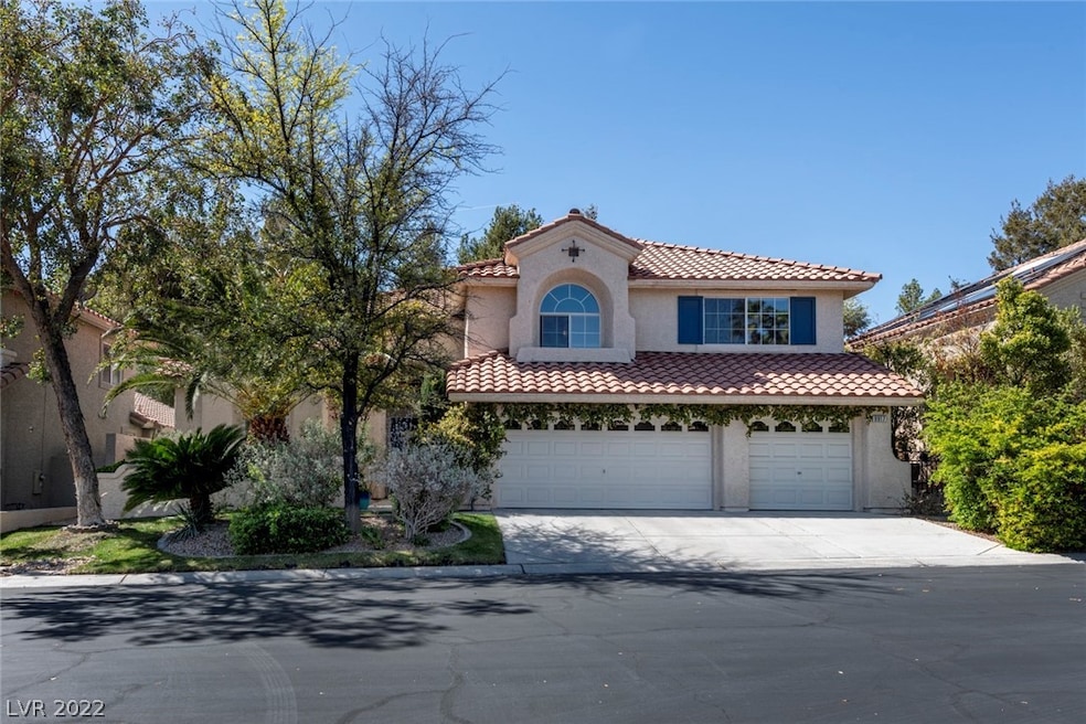 TIMELESS TWO-STORY IN DISTINCTIVE GATED 