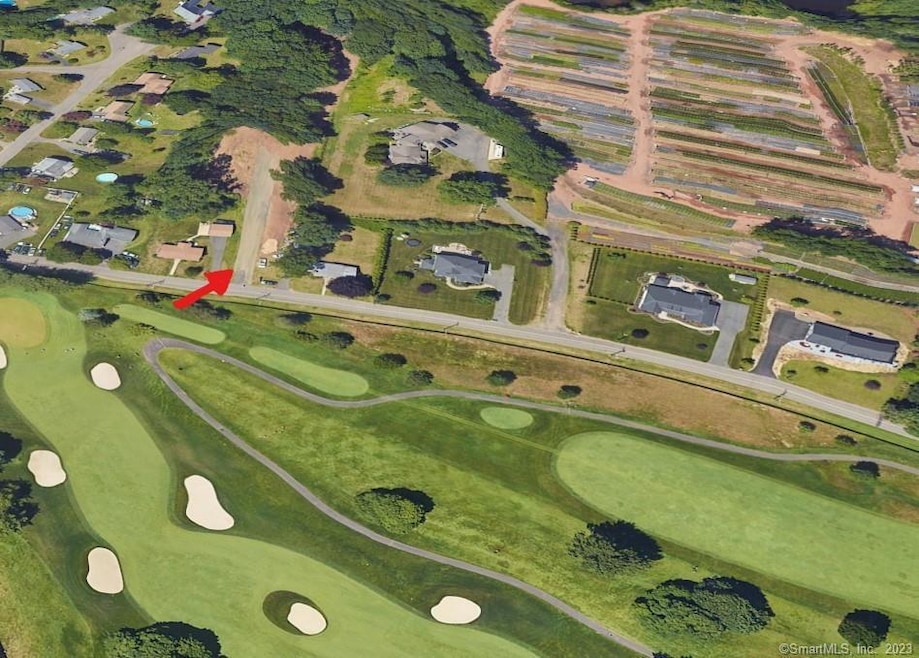 Google Earth Image, arrow points to driveway