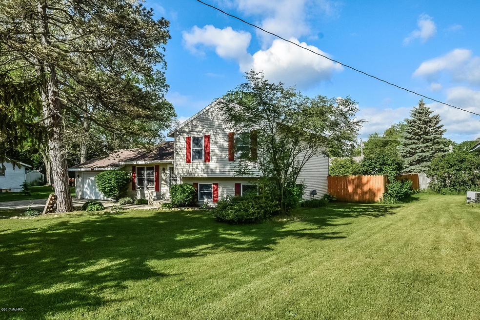 1044 Riverside Dr, Lowell, MI 49331 - photo 1