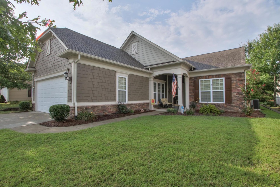 Gated Community! Surry Crest Plan with no steps. Attractive exterior-decorative stone, shake siding and durable concrete fiberboard, 