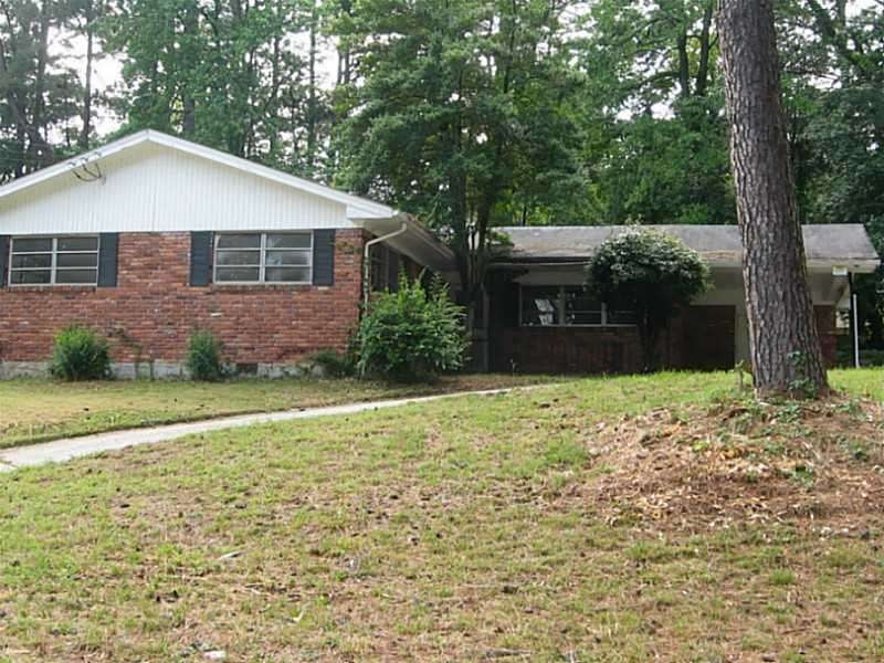 Exterior Front. 4 sides brick one-level home in a 