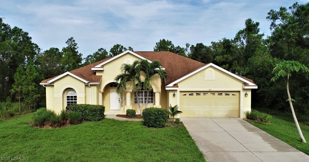 704 Aletha Ave S, Lehigh Acres, FL 33974 - photo 1