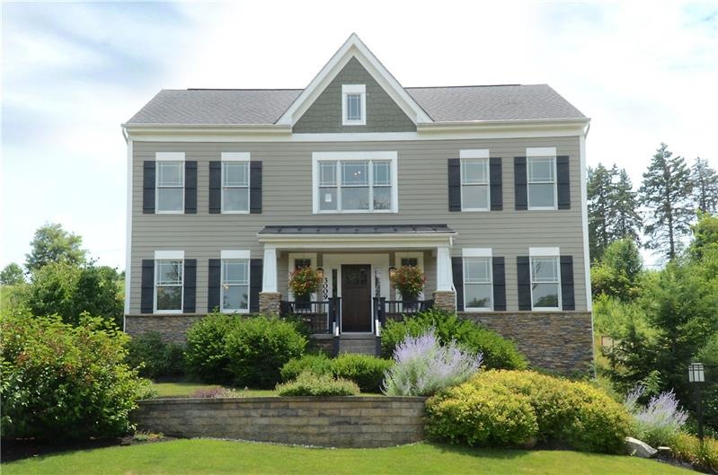 Welcome home to this stunning home located on a qu