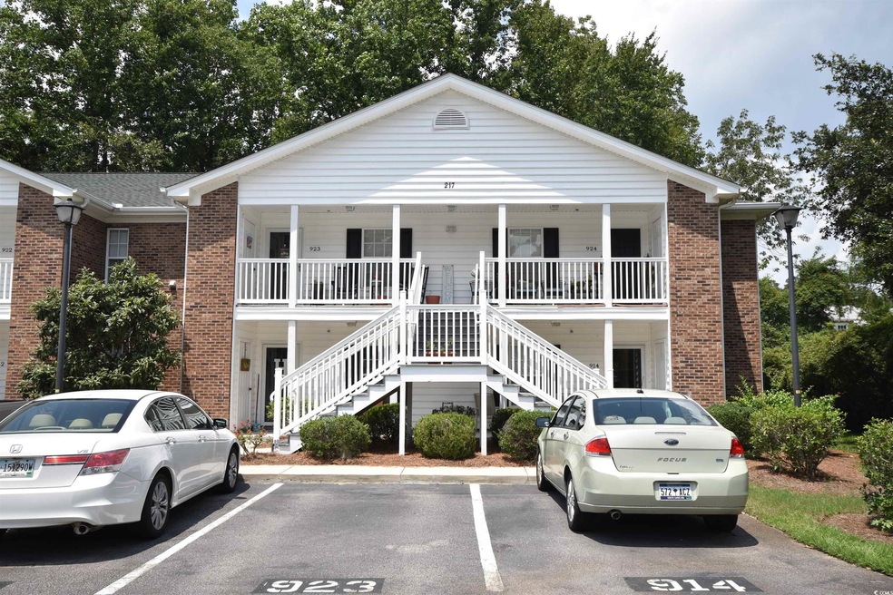 View of front of house with covered porch