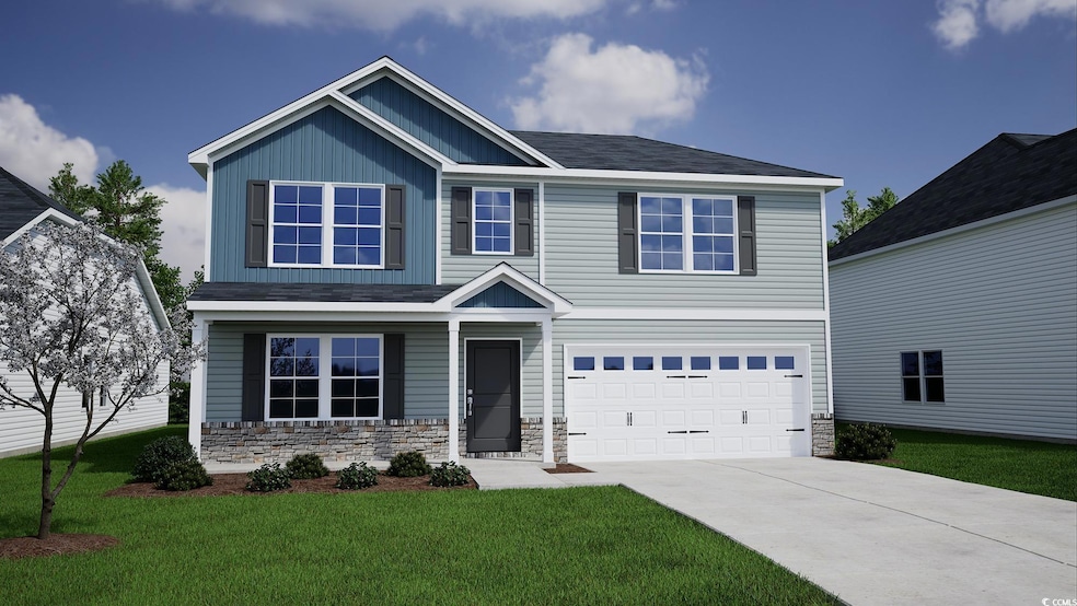 Craftsman house with a front lawn, an attached gar