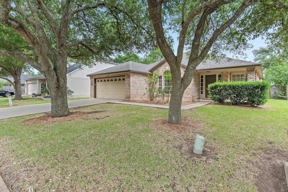 Ranch-style house with a front lawn, roof with sh