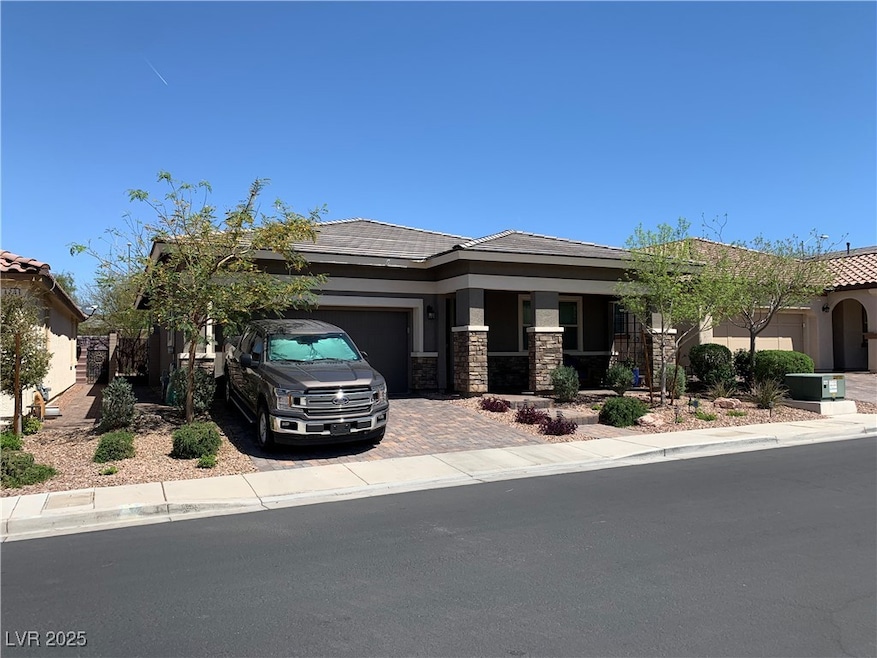 View of front of property with an attached garage,