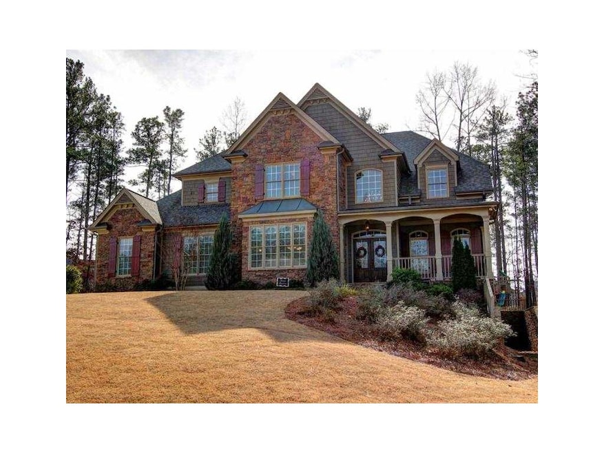 Exterior Front. Custom Built Stone & Shake w/Flags