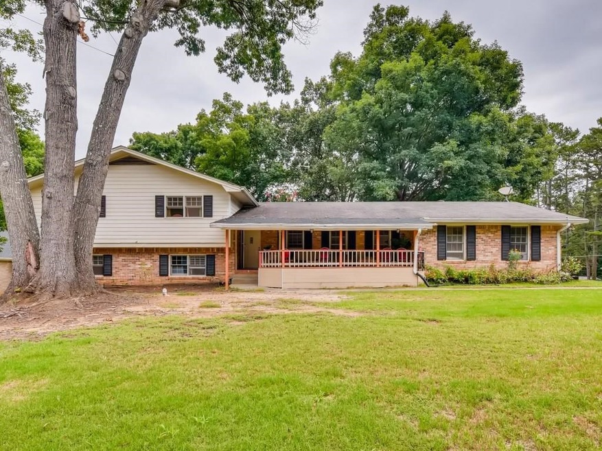 2048 McDaniels Bridge Rd SW, Lilburn, GA 30047 - photo 1