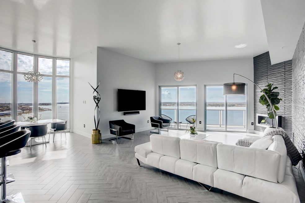 Spacious living area with floor to ceiling views o