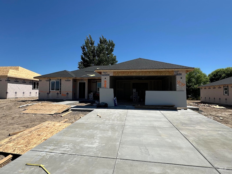 Property in mid-construction featuring an attached garage
