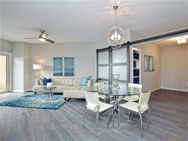 LIVING, DINING AND STUDY/GUEST BEDROOM. THE DOORS 